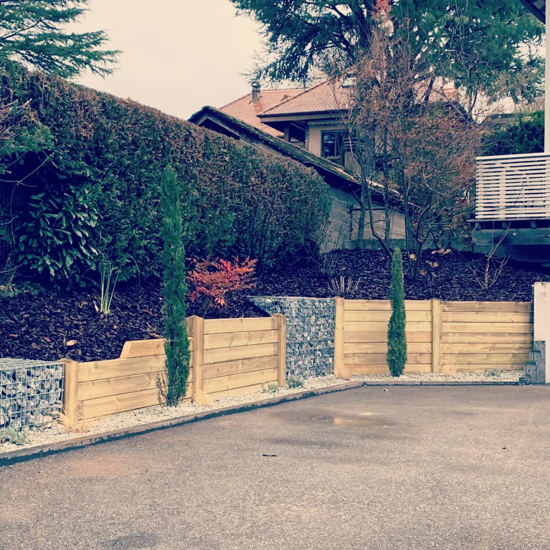 Retaining wall in treated pine and gabions